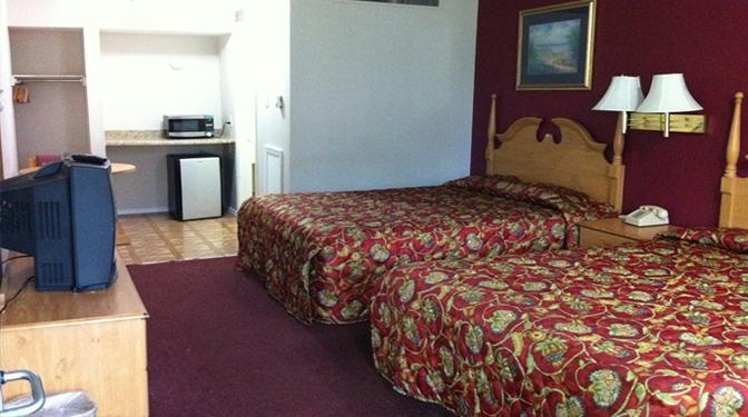 ساجيناو Welcome Inn And Suites الغرفة الصورة
